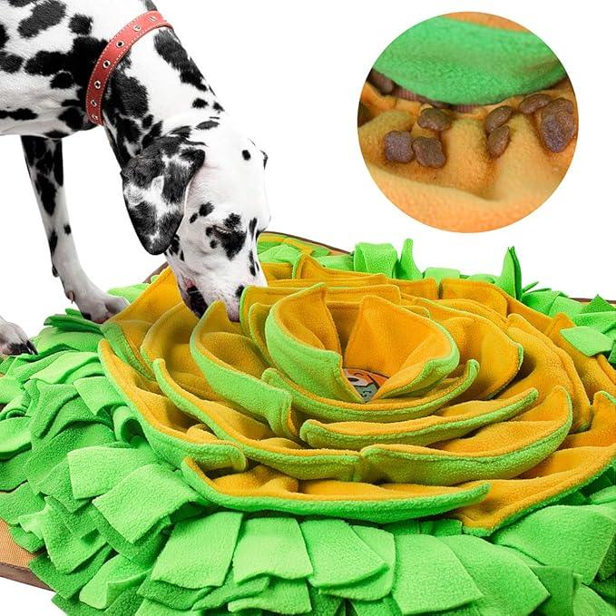 Dalmatian using green and yellow dog snuffle mat for interactive feeding and enrichment